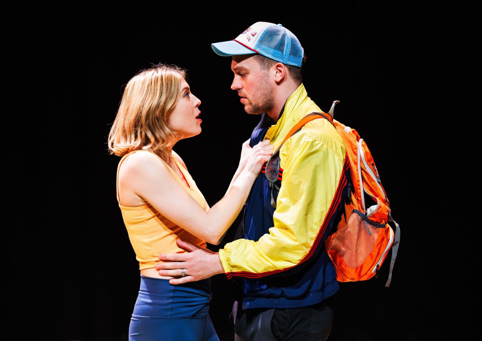 Production photo of Rotten by Emmerson & Ward - a young man anad woman are holding each other while looking into their eyes