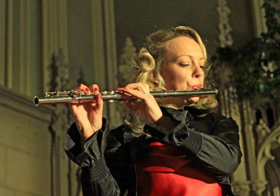 Helen Longworth Plays the flute in a church