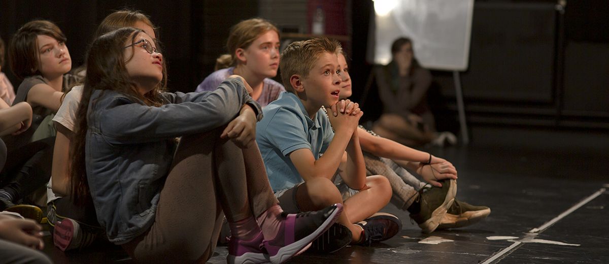 children say on the floor 