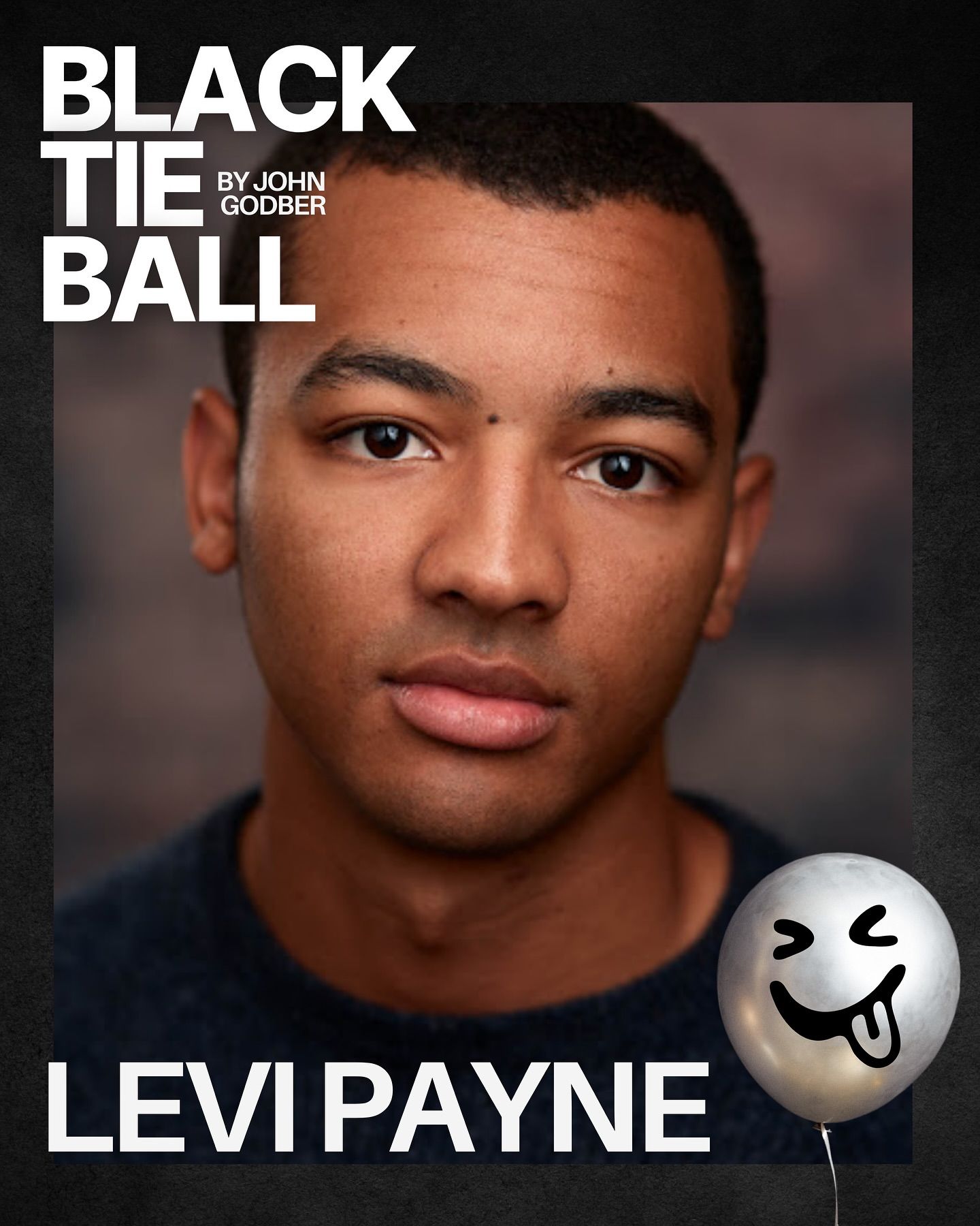 A head shot of performer Levi Payne wearing a blue sweater and looking directly to camera. Black Tie Ball by John Godber at The Dukes Theatre