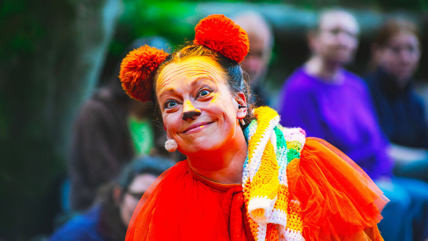 A close up of the Lion (Helen Longworth) smiling. The Wizard of Oz by the Dukes, photos by Gabi Dawkins.