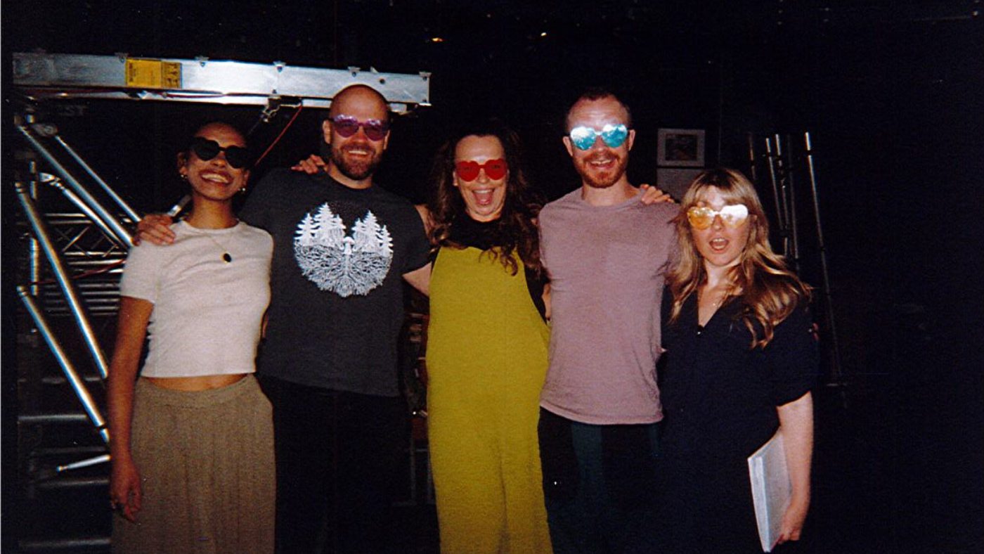From the left. Hope Yoland, Matthew Ganley, Helen Longworth, Gareth Cassidy and Elvi Piper, linked together, wearing heart shaped glasses. Photo taken by The Wizard of Oz Team. 