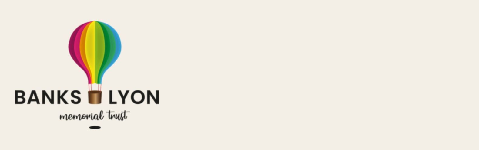 Banks Lyon Memorial Trust logo of a rainbow coloured hot-air balloon