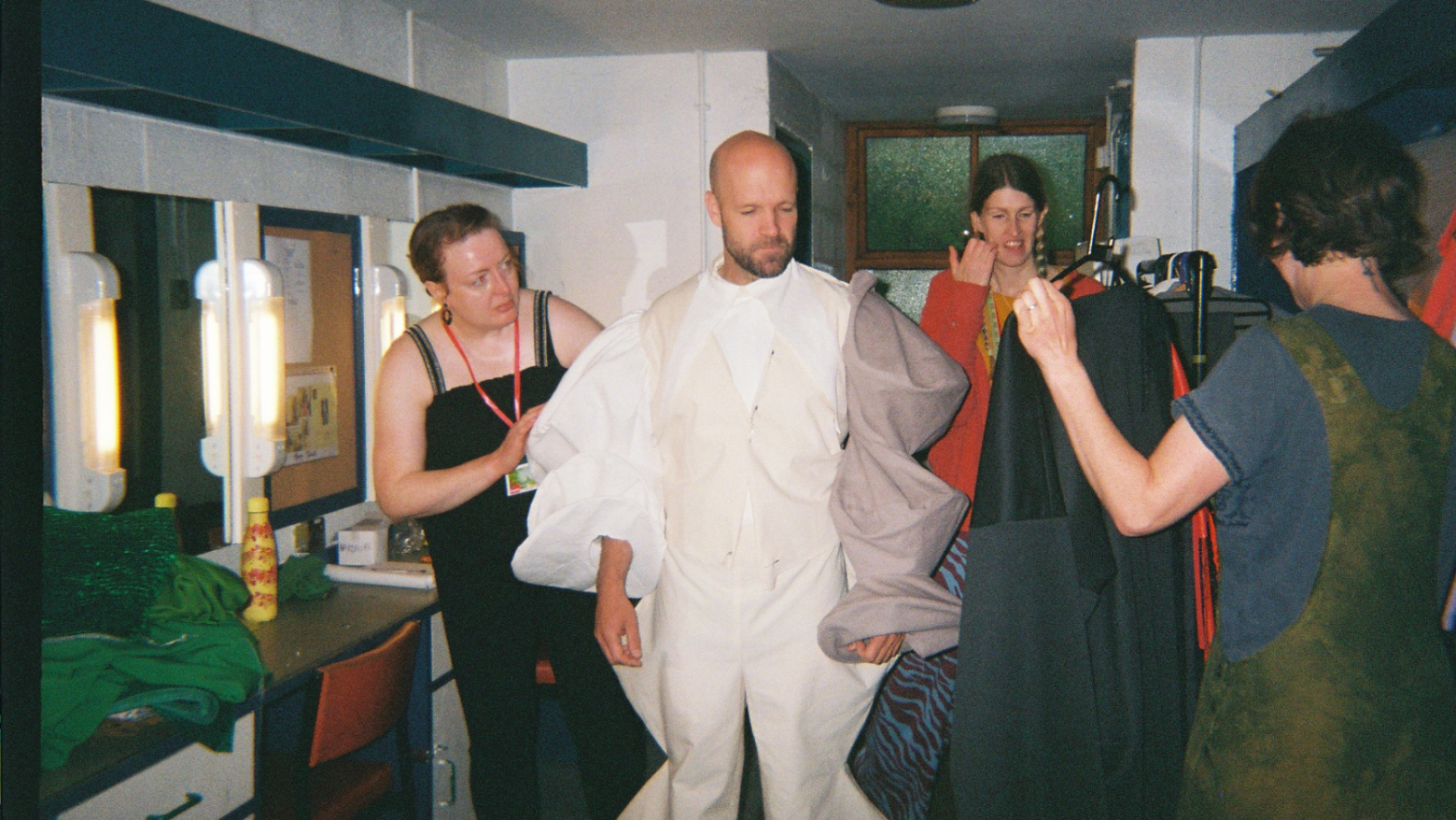The Oz Guard fitting, with Matthew Ganley in costume and Laura O'Connor, Katie Duxbury and Roisin Brennan, from the Costume Department, assisting. Photo taken by The Wizard of Oz Team. 