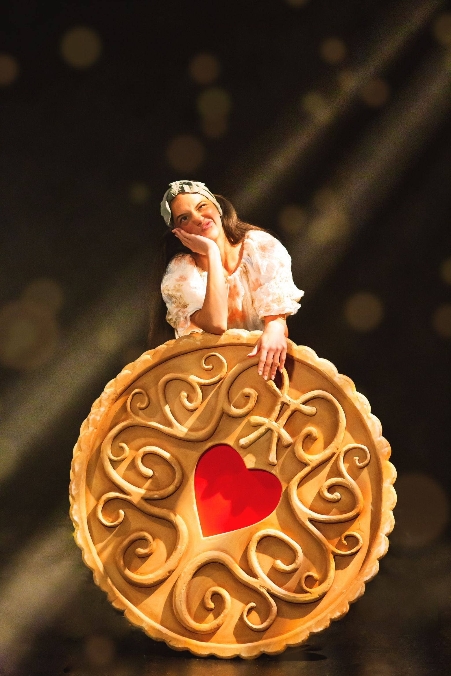 Arrietty with a giant jammy dodger. The Borrowers by the Dukes, photo by Gabi Dawkins