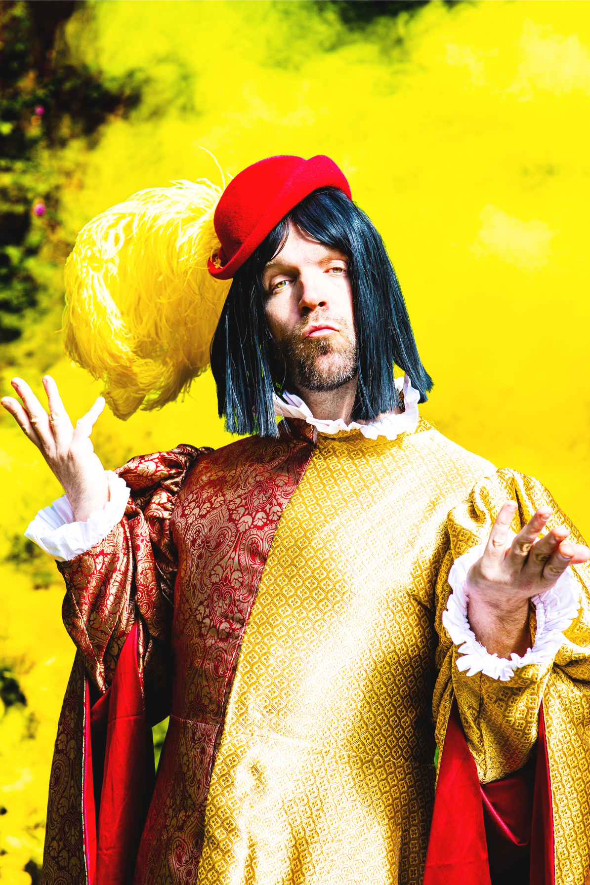 Prince Foppingham in the park surrounded by yellow smoke, wearing a red and yellow outfit
