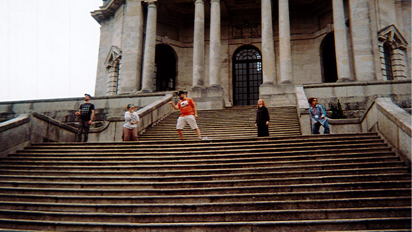 The cast rehearsing 'Founders Day' at the top of the main stairs of the Ashton Memorial. Photo taken by The Wizard of Oz Team. 