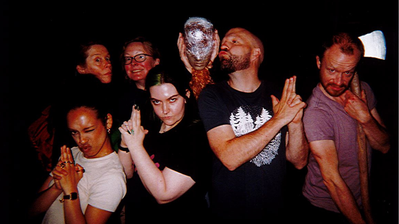 From the left, Hope Yoland, Lisa Howard, Lou Manifold, Siobhan Ashton, Matthew Ganley and Gareth Cassidy, posing like the Charlies Angels, around a Mannequin head. Photo taken by The Wizard of Oz Team. 