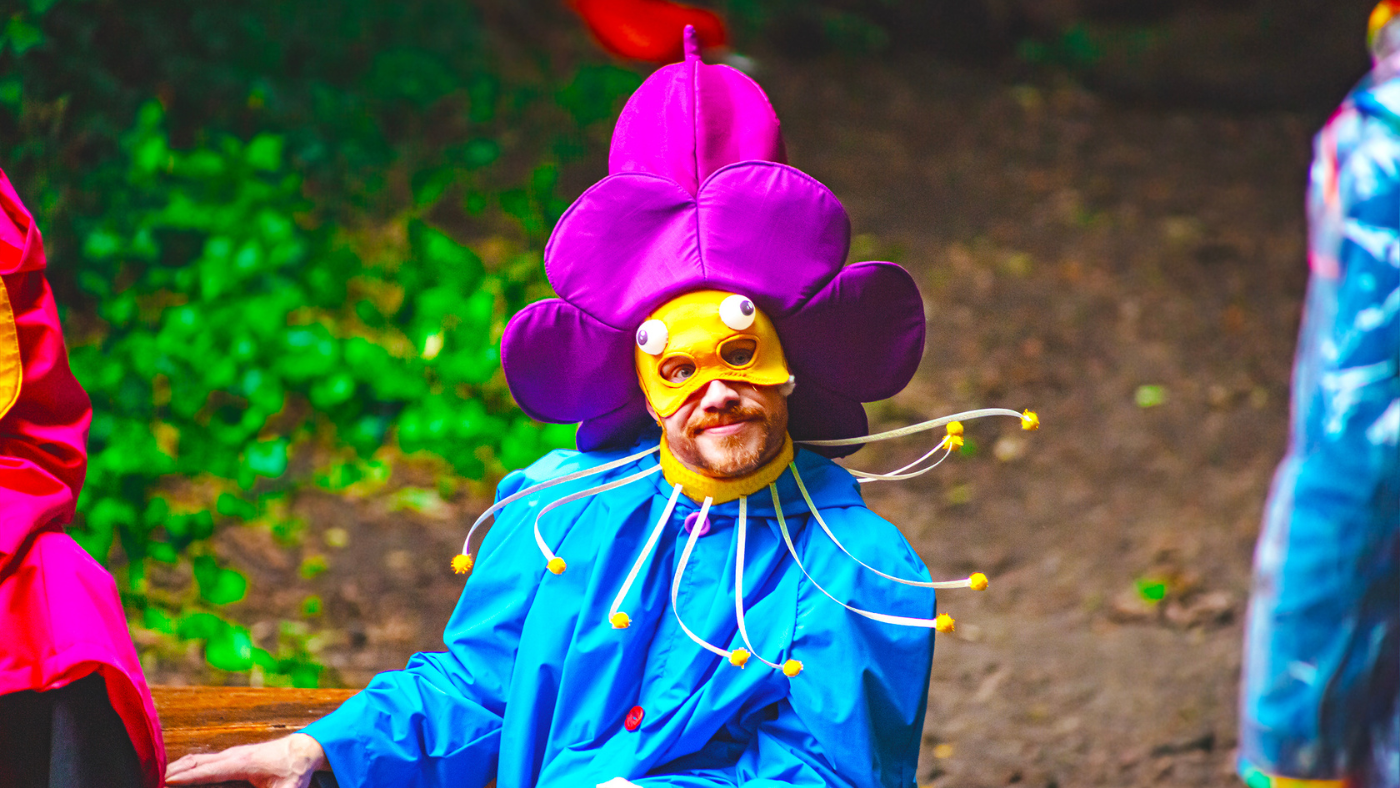 A close up of one of three Munchkins (Gareth Cassidy) making a silly face. The Wizard of Oz by the Dukes, photos by Gabi Dawkins.