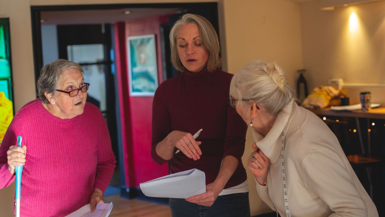 Sal Lofthouse with two prime time members reading from script