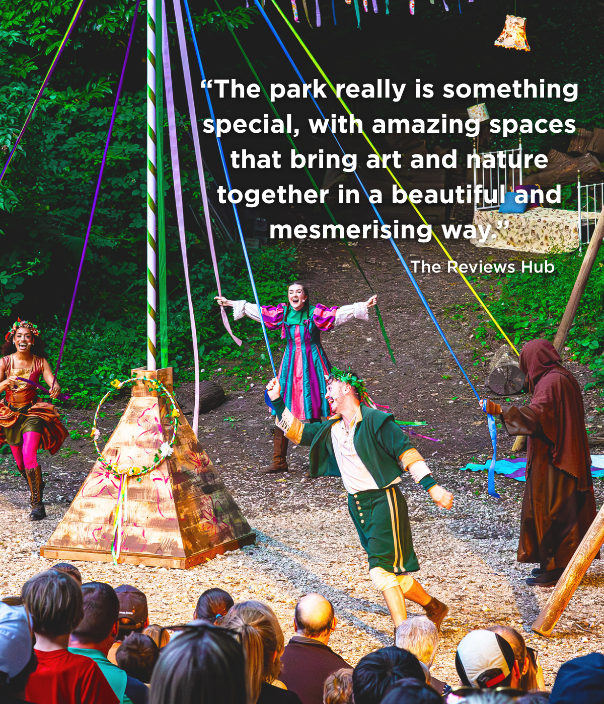 The park show cast dancing around a maypole in the Dell 