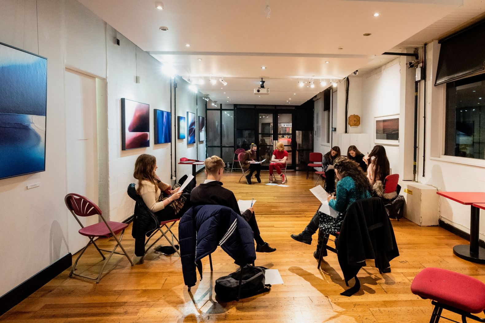 An art gallery space, capacity 50 with seats in the round.