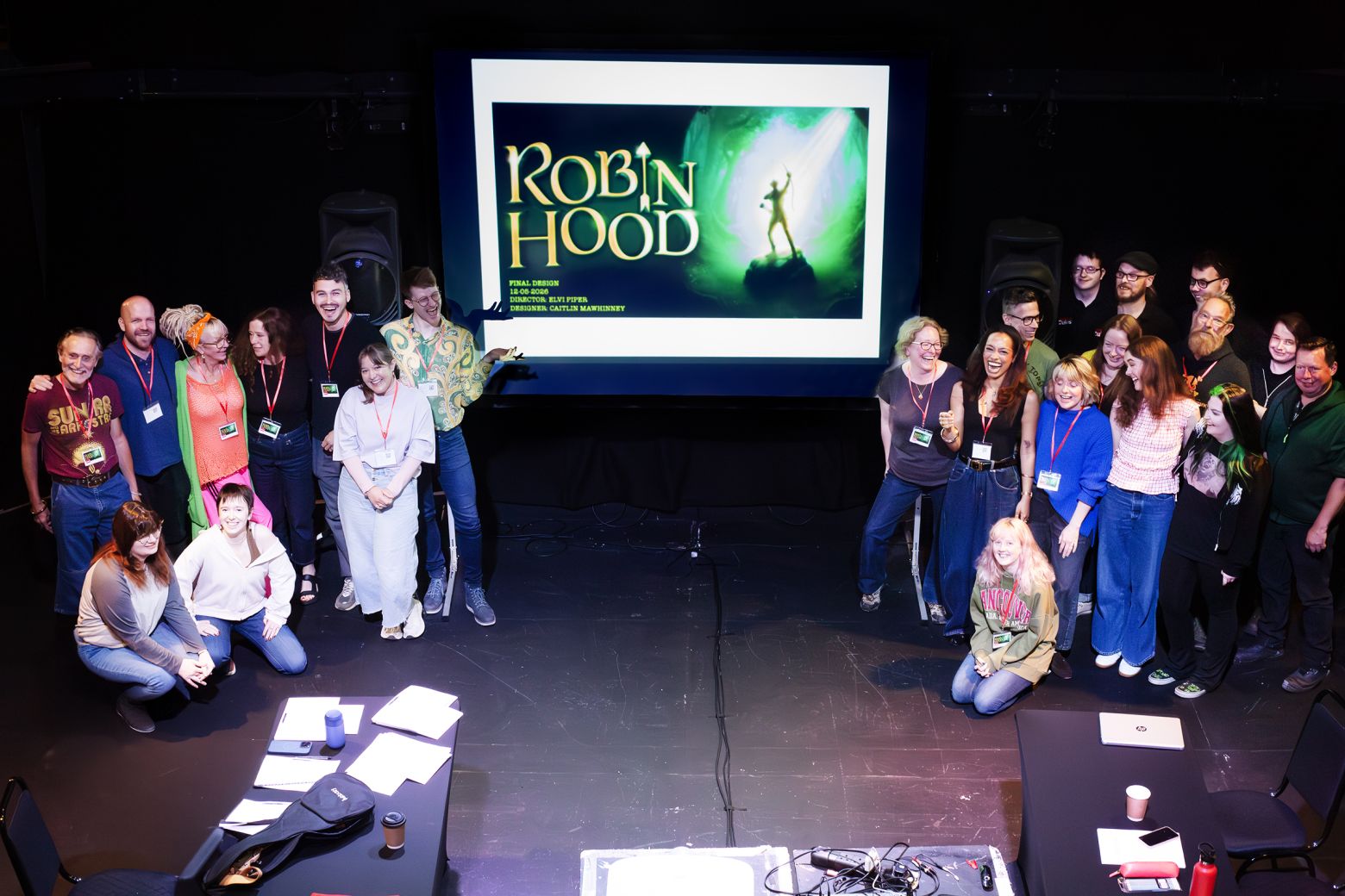 The Robin Hood Cast and Crew laughing in group a photo