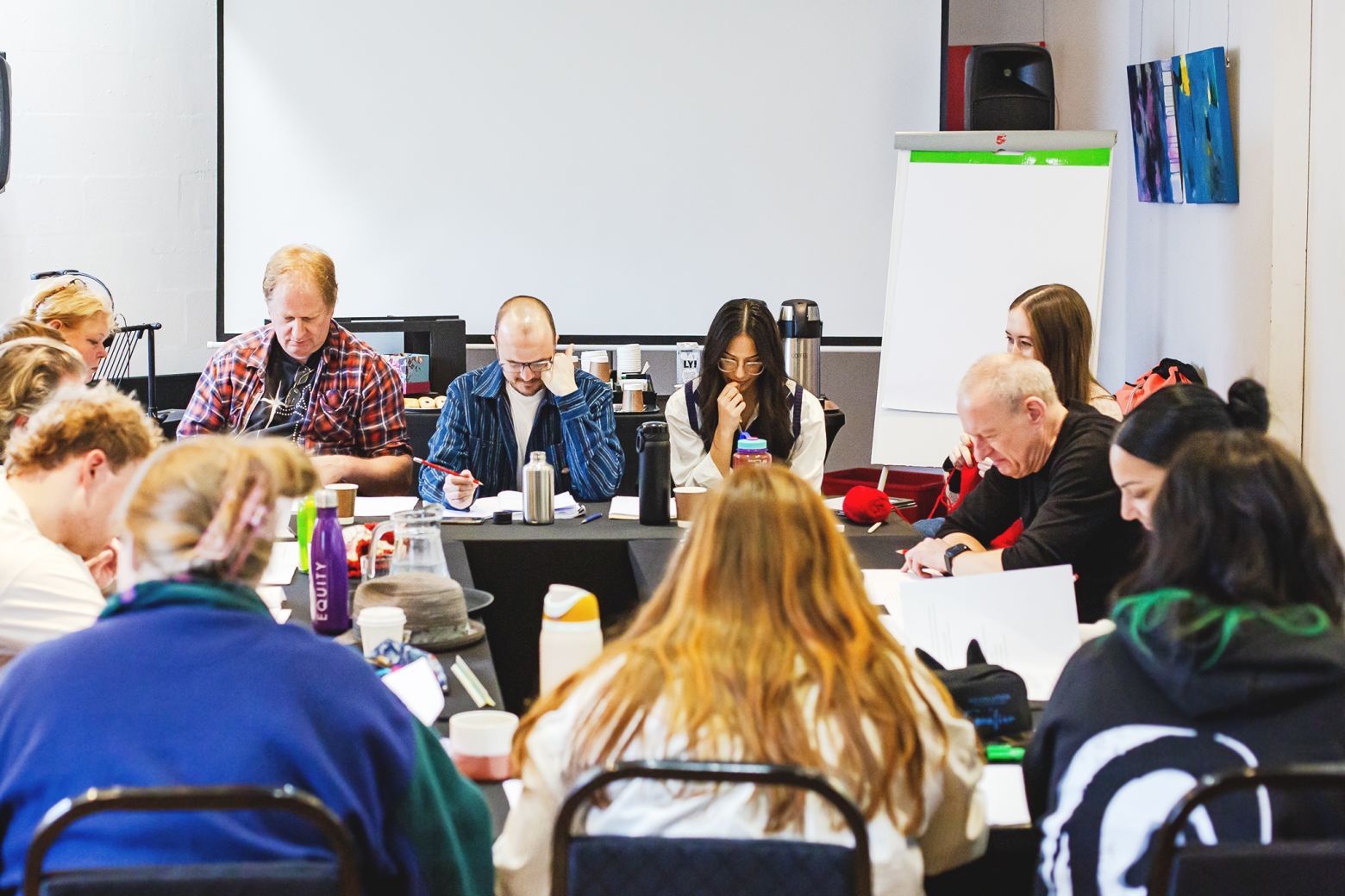 Full cats and crew reading script. The Borrowers at the Dukes, photo by Gabi Dawkins.